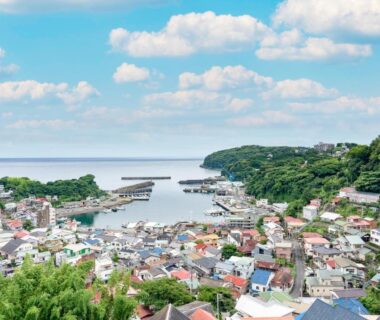Overlooking coastal town and harbor near Tabist Miyoshi Ryokan Odawara Manazuru in Kanagawa, Kantō