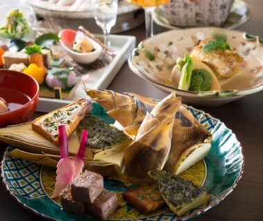 Assorted Japanese dishes arranged for a ryokan meal at Tachibana Shikitei in Ishikawa, Chūbu region