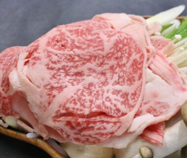 Thinly sliced marbled beef with enoki mushrooms at Takasagoya Ryokan, Yamagata