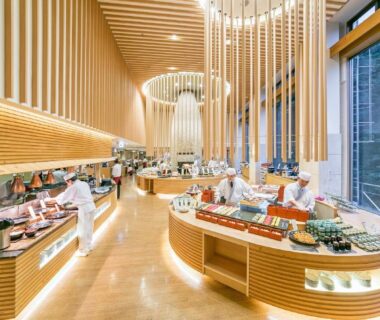 Wood-paneled buffet counters and large windows at Tateshina Grand Hotel in Nagano