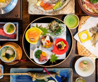 Assorted small Japanese dishes on trays at Tatsuta Ryokan, Shizuoka, Chūbu Japan