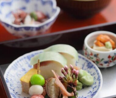 Assorted ceramic dishes and soup bowl on lacquer tray at Tazuru ryokan Kyoto