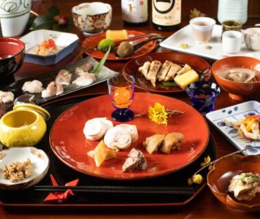 Assorted traditional Japanese dishes on lacquer trays at Temple Hotel 正暦寺 Kyoto