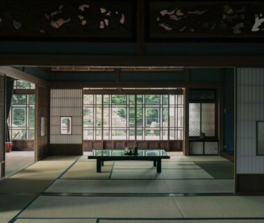 Traditional tatami room with low table and shoji screens at Temple Lodging Shukubo Kakurinbo in Yamanashi