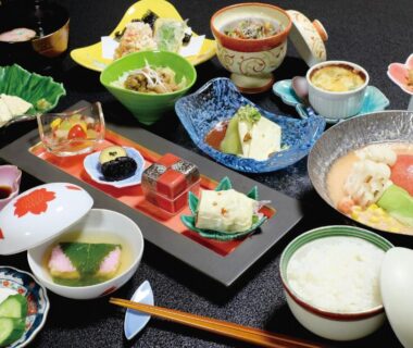 Assorted Japanese small dishes and rice with chopsticks at Temple Lodging Shukubo Kakurinbo, Yamanashi, Chūbu