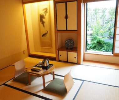 Traditional tatami room with low table, shoji screens and garden view at The Edo Sakura in Tokyo
