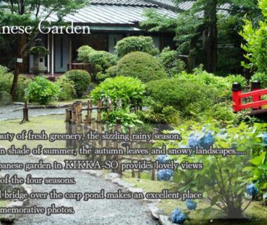 Japanese garden with red bridge at The Fujiya Hotel, Kanagawa, Japan