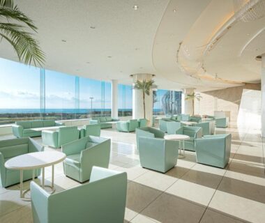 Bright lounge with floor-to-ceiling windows at The Gran Resort Elegante Awajishima in Hyōgo, Kansai