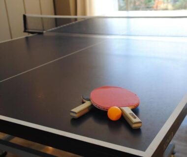 Two paddles and orange ball on table tennis table at The Gran Resort Princess Fujikawaguchiko, Yamanashi