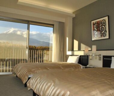 Twin beds with balcony facing Mount Fuji at The Gran Resort Princess Fujikawaguchiko, Yamanashi