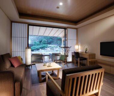 Cozy tatami seating area with low table, shoji screens and garden view at Toba International Hotel Shiojitei Mie
