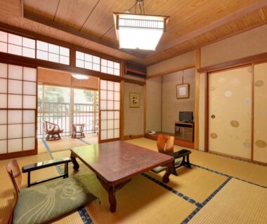 Traditional tatami room with low table and shoji doors at Togakubo in Kanagawa Kanto region