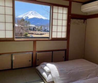Futons on tatami, shoji window framing Mount Fuji at Togawaso in Yamanashi, Chūbu
