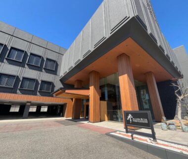 Modern building entrance with wooden pillars at Tokigasane in Chūbu Ishikawa prefecture