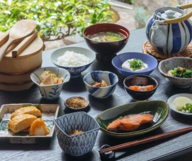 Grilled fish, rice, miso soup and side dishes at Toshiharu Ryokan in Kyoto