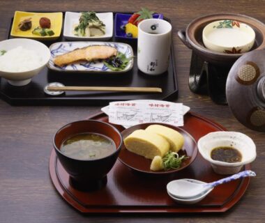 Traditional Japanese breakfast with grilled fish, tamagoyaki, rice and miso soup at Towa Ryokan Kyoto