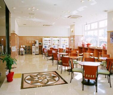 Bright dining area with tables and chairs at Toyoko Inn Maebashi Ekimae in Gunma, Kantō