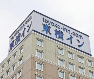 Beige hotel exterior with Toyoko Inn rooftop sign, Maebashi Ekimae, Gunma