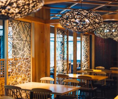 Interior dining area with lattice screens and pendant lights at Tsuetate Onsen Hotel Hizenya in Kumamoto, Kyushu