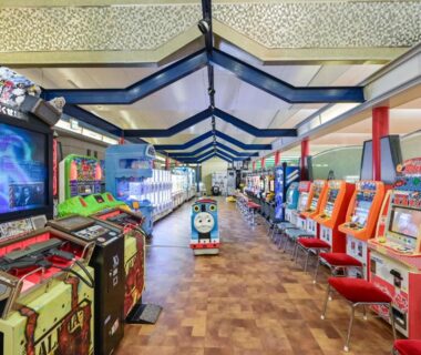 Arcade game machines lining a corridor at Tsuetate Onsen Hotel Hizenya, Kumamoto, Kyūshū, Japan