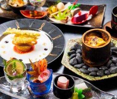 Assorted small traditional dishes on lacquer trays served at Tsukasa Ryokan in Saga, Kyushu