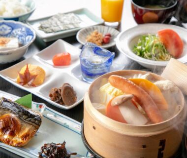 Steamed seafood and grilled fish breakfast spread at Tsukasa Ryokan, Saga, Kyūshū