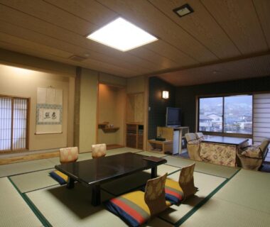 Traditional tatami room with low table and shoji screens at Tsuki no Shizuka in Nagano, Chūbu