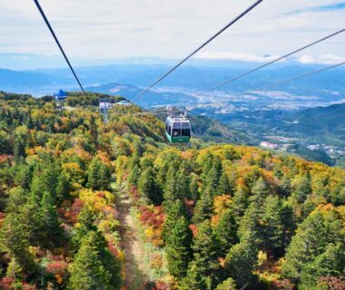 Gondola above colorful mountain forest near Tsukinoike in Yamagata Tōhoku