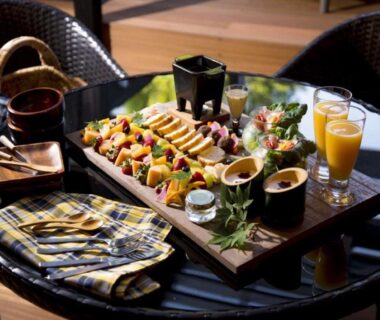 Assorted dining platter on round table with juice glasses, Tsutaya Tokinoyado Kazari, Nagano