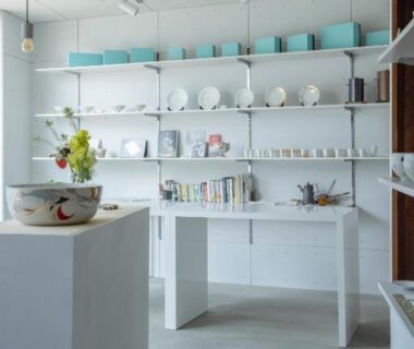 White shelves with pottery and tableware inside UTAHI A 100-years-old Kyoto machiya shop Kyoto Kansai