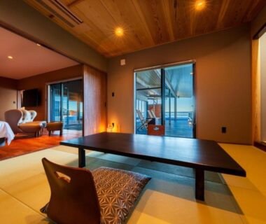 Tatami seating with low table and cushion at Umine Annex Ōita Kyushu