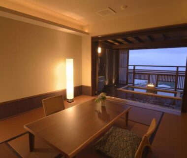 Tatami room with low table, chairs and balcony at Uminohana, Shizuoka, Chūbu Japan