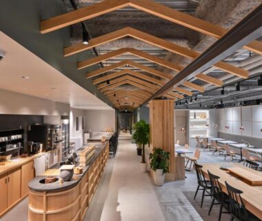 Long wooden communal tables and open counter at Ureshino Onsen Yadoya Uchiroji in Saga, Kyūshū