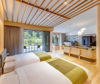 Spacious twin room with wooden interior and garden view at URESHINO YADOYA, Saga