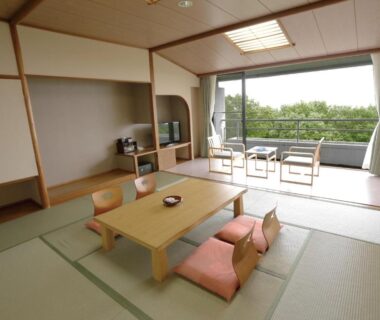 Tatami room with low table and balcony chairs at Villa Inawashiro, Fukushima, Tōhoku
