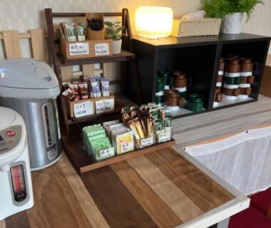 Self-serve tea and condiments station with electric dispenser at Village Sun Lake Kawaguchiko, Yamanashi, Chūbu Japan