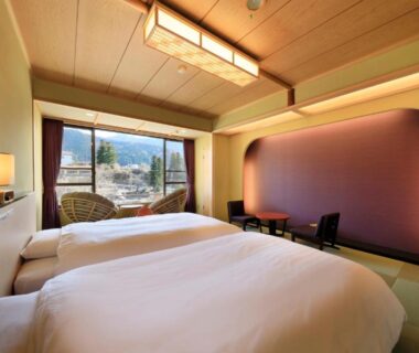 Twin beds in Japanese-style room at Wafu-no-Yado MASUYA, Nagano, Chūbu, Japan