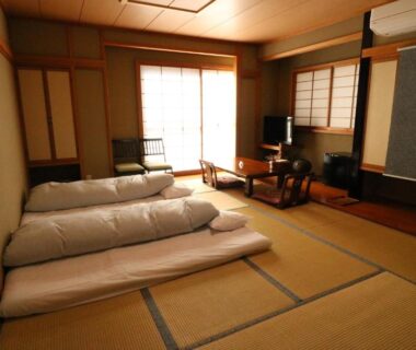 Traditional tatami room with three futons at Wakamizusou in Yamanashi, Chūbu, Japan
