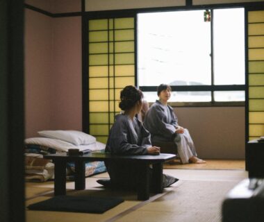Two guests in yukata seated at low table on tatami in Wakatake ryokan, Wakayama, Kansai