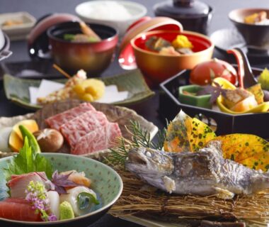 Assorted traditional Japanese dishes on small platters at Wan Wan Paradise Matsusaka in Mie, Kansai