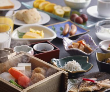 Assorted Japanese breakfast dishes with grilled fish and steamed vegetables, Wan Wan Paradise Matsusaka, Mie