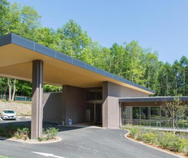 Modern entrance canopy and driveway at Wan Wan Paradise Yatsugatake in Yamanashi, Chūbu region