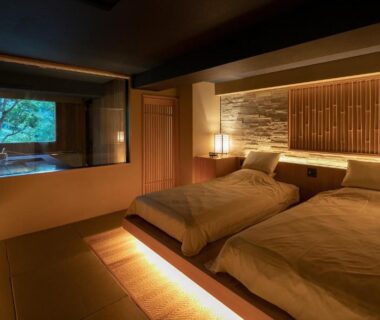 Tatami room with twin beds and garden window at Watei Kazekomichi, Shizuoka, Chūbu Japan