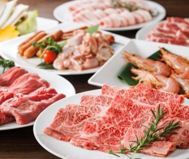 Marbled beef slices, prawns, and vegetables arranged on plates for a meal at Yatsugatake Kogen Resort, Yamanashi
