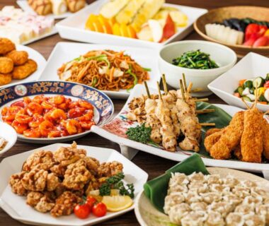 Varied plated Japanese dishes and fried items at Yatsugatake Kogen Resort in Yamanashi