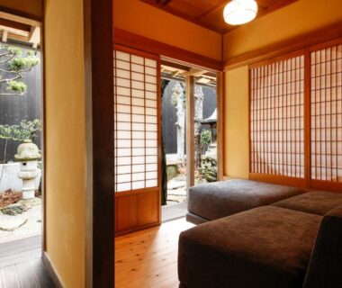 Traditional tatami room with shoji screens, low seating and courtyard garden at Yamasaki Ryokan, Hyōgo, Kansai