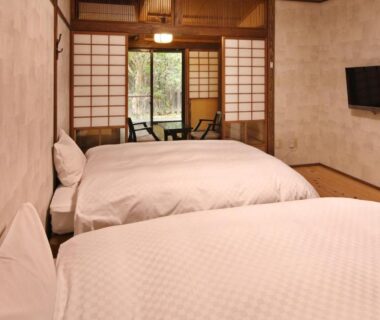 Tatami room with twin beds and shoji screens at Yamashinobu, Kumamoto, Kyūshū