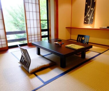 Traditional tatami room with low table and shoji screens at Yamazatonoiori Soene in Gifu, Chūbu, Japan