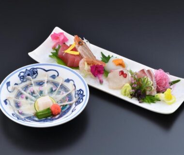Assorted sashimi on ceramic plates at Yasaka Yutone Kyokoyado, Kyoto