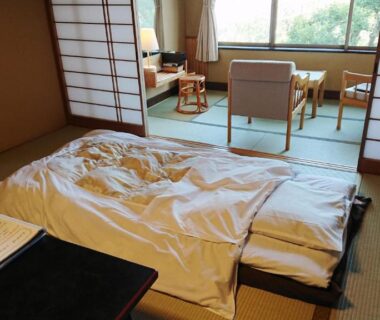 Futon on tatami with shoji and seating by window, Yokikan, Shizuoka, Chūbu Japan